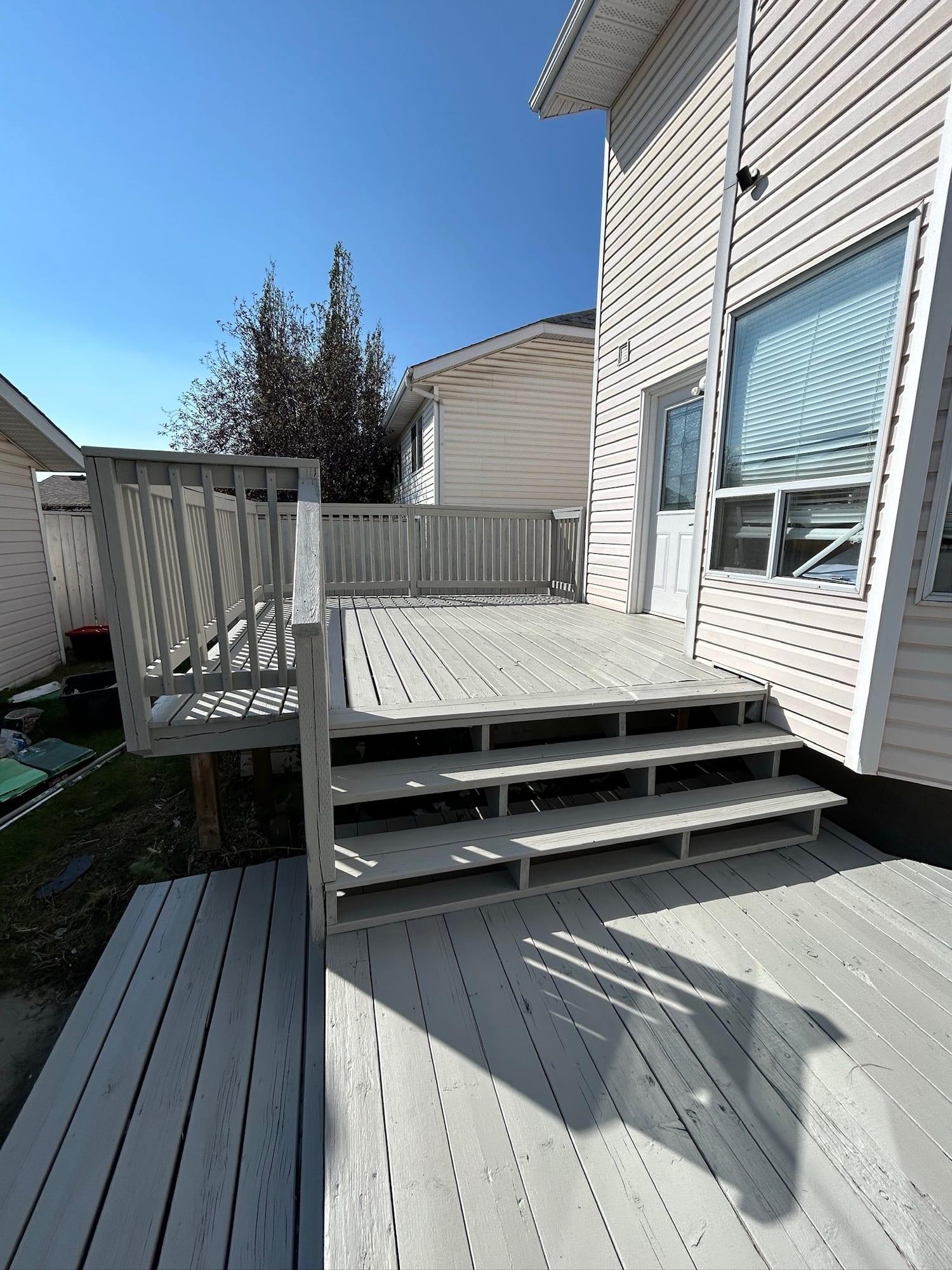 Repainted deck, steps and railings in light grey