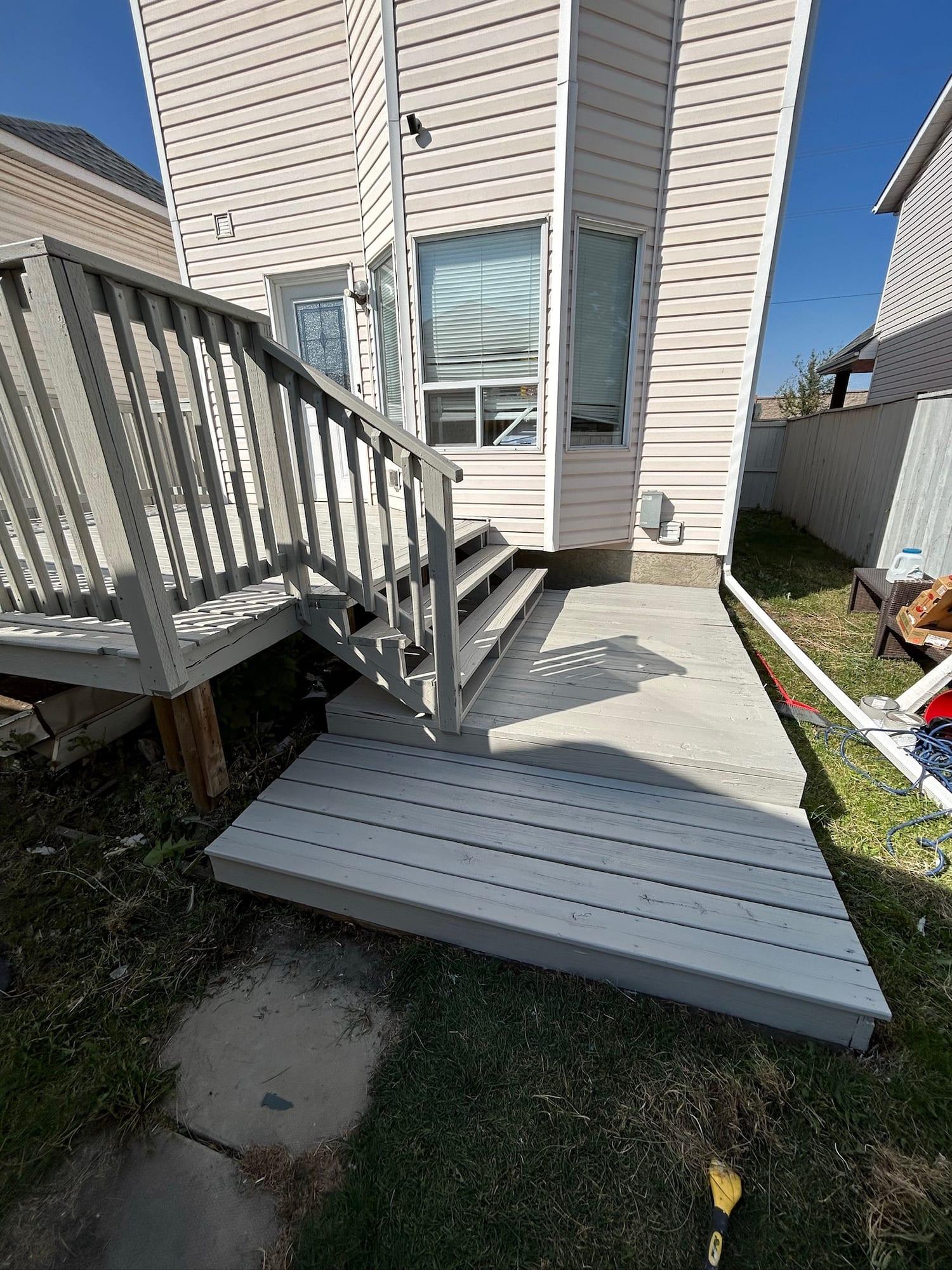 The same deck after preparation and repainting in light grey