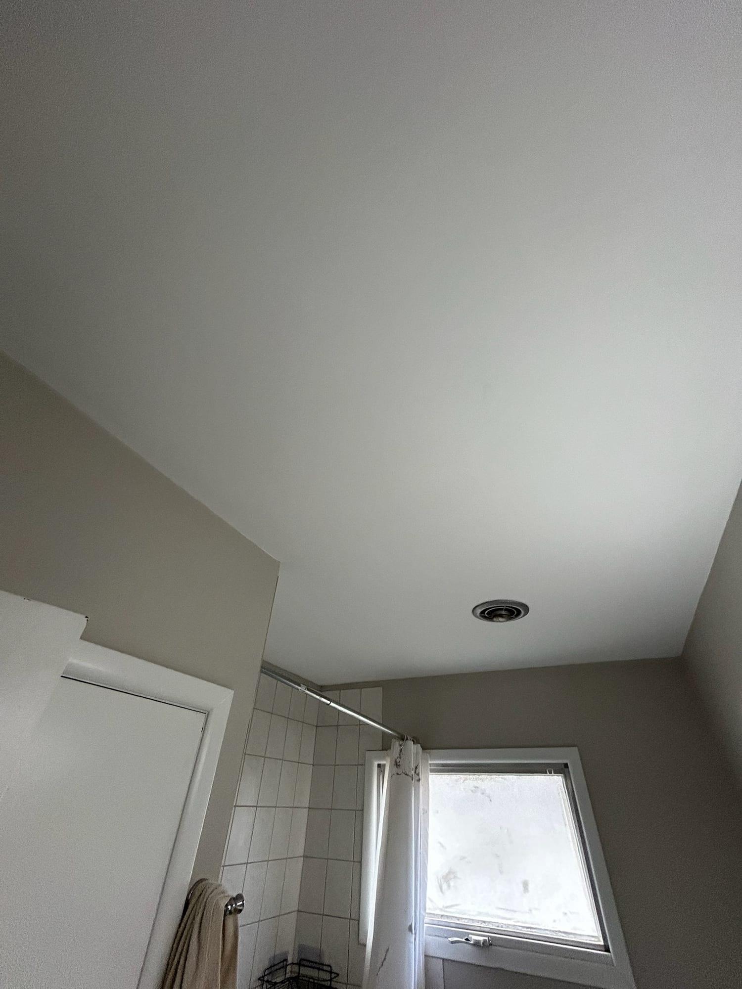 The same bathroom ceiling after repainting